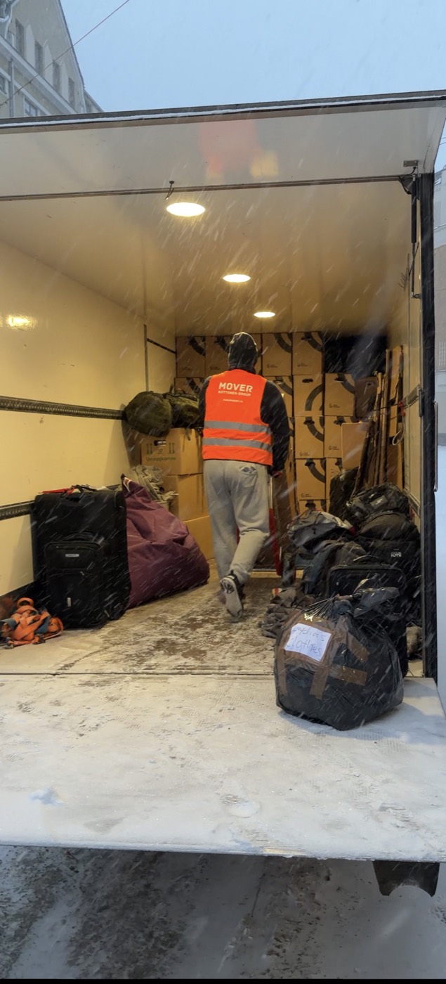 Loading a moving truck in winter — items protected